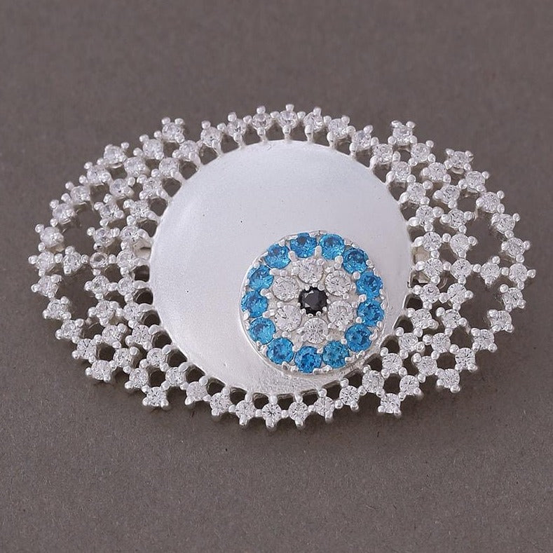 White zircon studded evil eye brooch