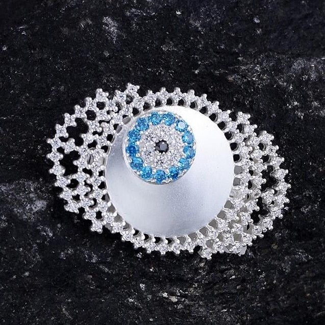 Evil eye brooch in white