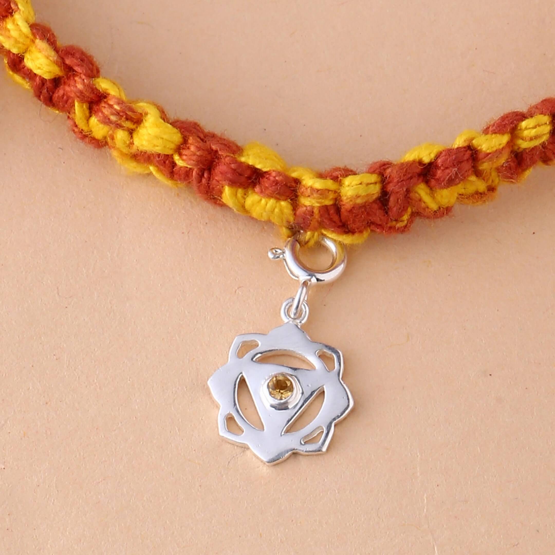 Manipura chakra rakhi in braided mauli