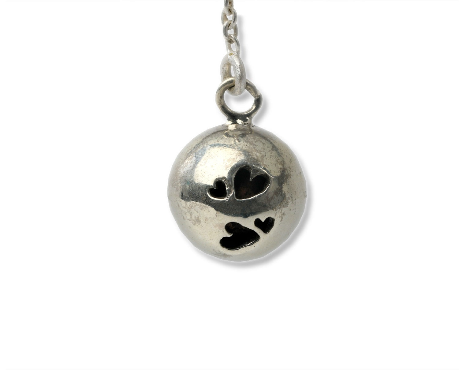 Heart cutwork musical ball pendant