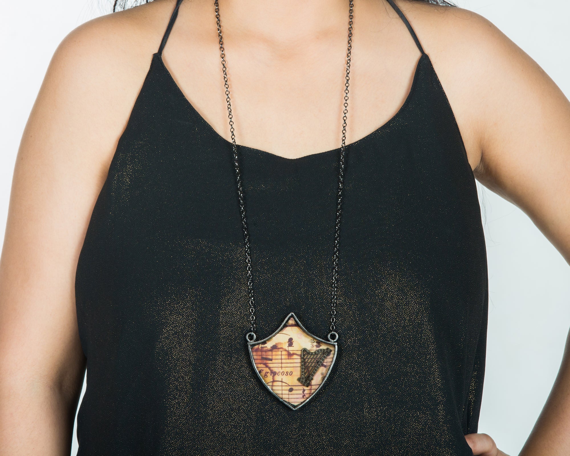 Harp musical shield neckpiece
