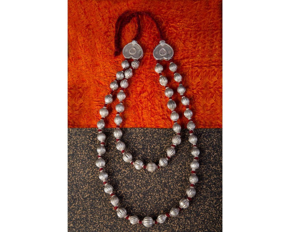Silver beads layered long neckpiece