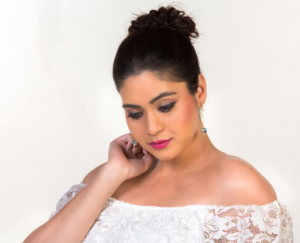Left view of meenakari pearl earrings