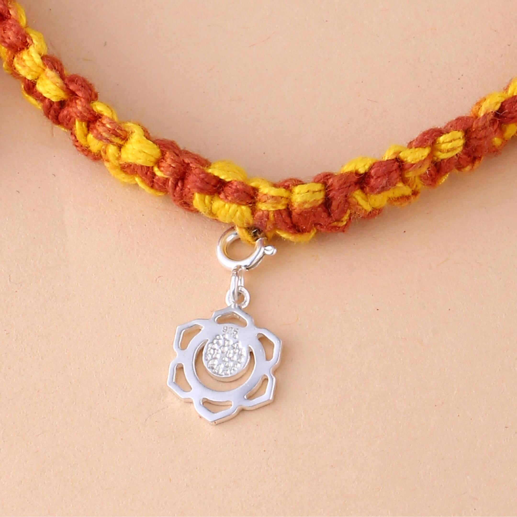 Swadhisthana chakra rakhi in braided mauli