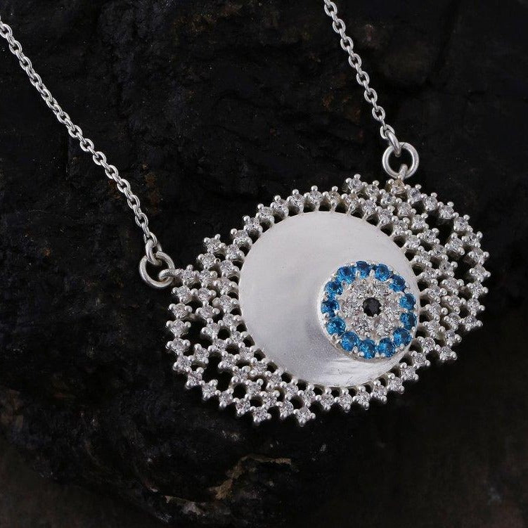 Evil eye neckpiece in white