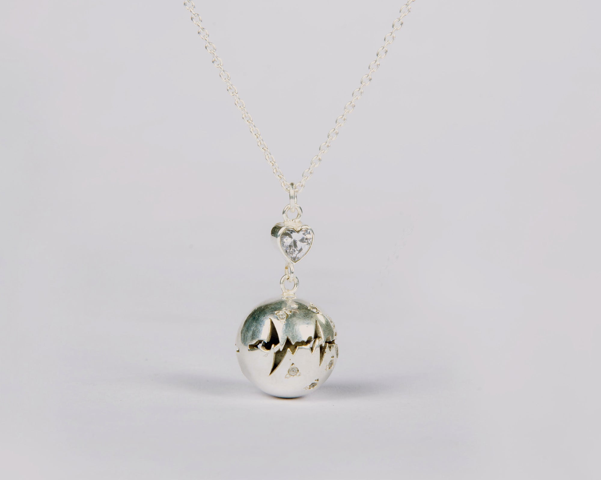 Zircon studded gamelan harmony ball pendant