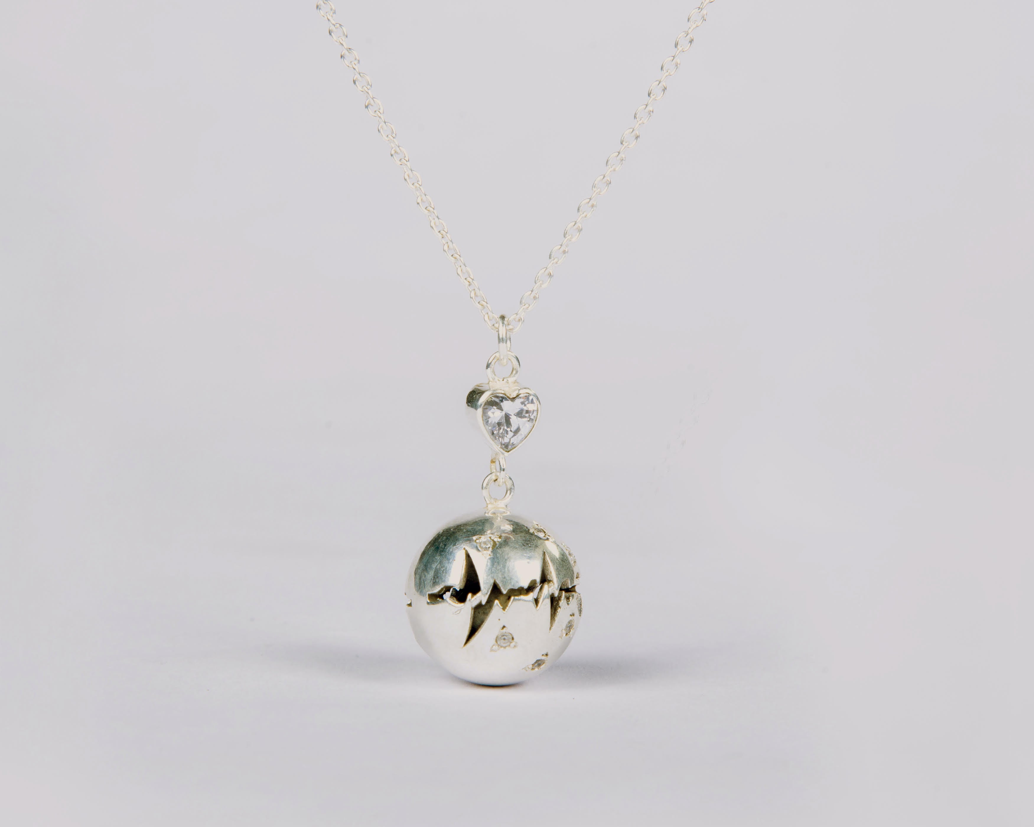 Zircon studded gamelan harmony ball pendant