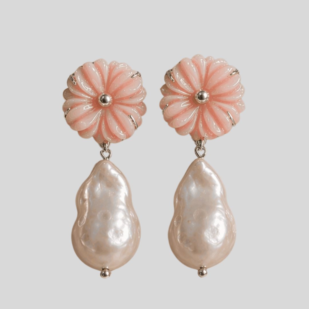 Nirwaana's Bloom earring — real pink opal, baroque pearl, recycled silver. Handcrafted in India. Ethical, artisanal, and entirely yours.