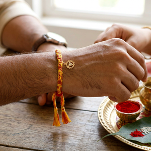 Vishuddha Chakra Rakhi With Gemstone - Gold