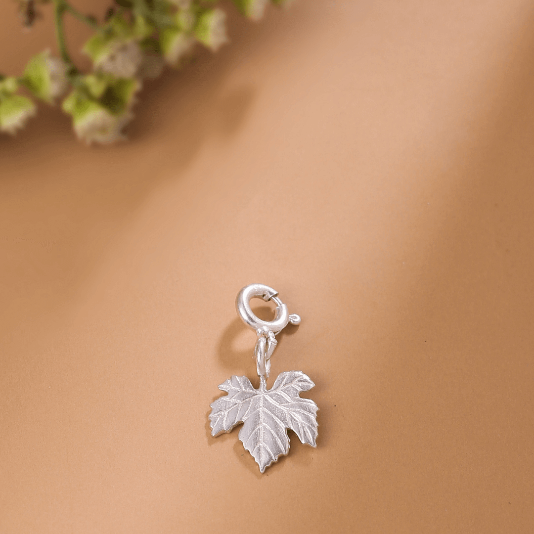 Detachable jewelry charms to be used as embellishments for bracelets, charm pendants in necklace, keyring charms. Crafted in Sterling silver by Nirwaana