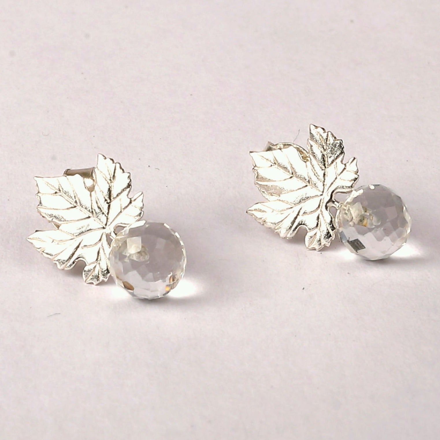 Silver ivy leaf and faceted crystal quartz ball earrings