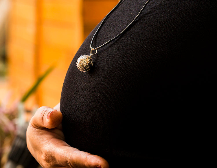 Celebrate motherhood with harmony ball pendant