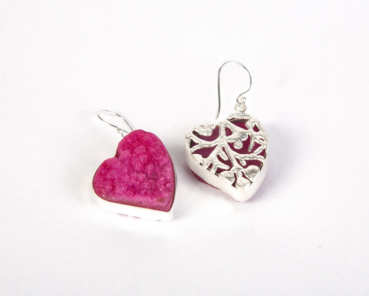 Back view of pink heart shaped earrings