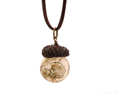 Acorn shaped pendant strung in a leather cord