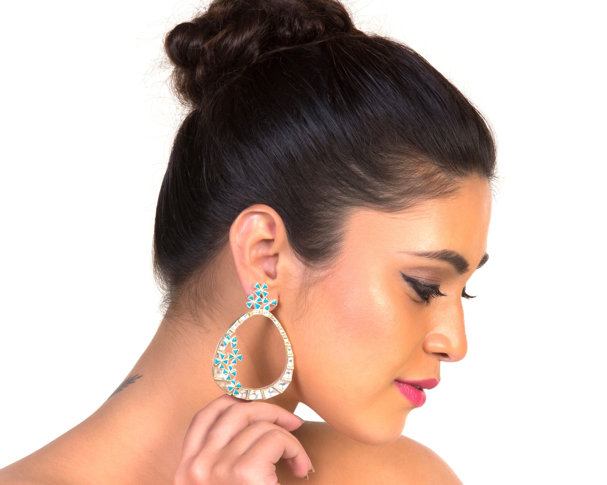 Model with kundan hoop style earrings