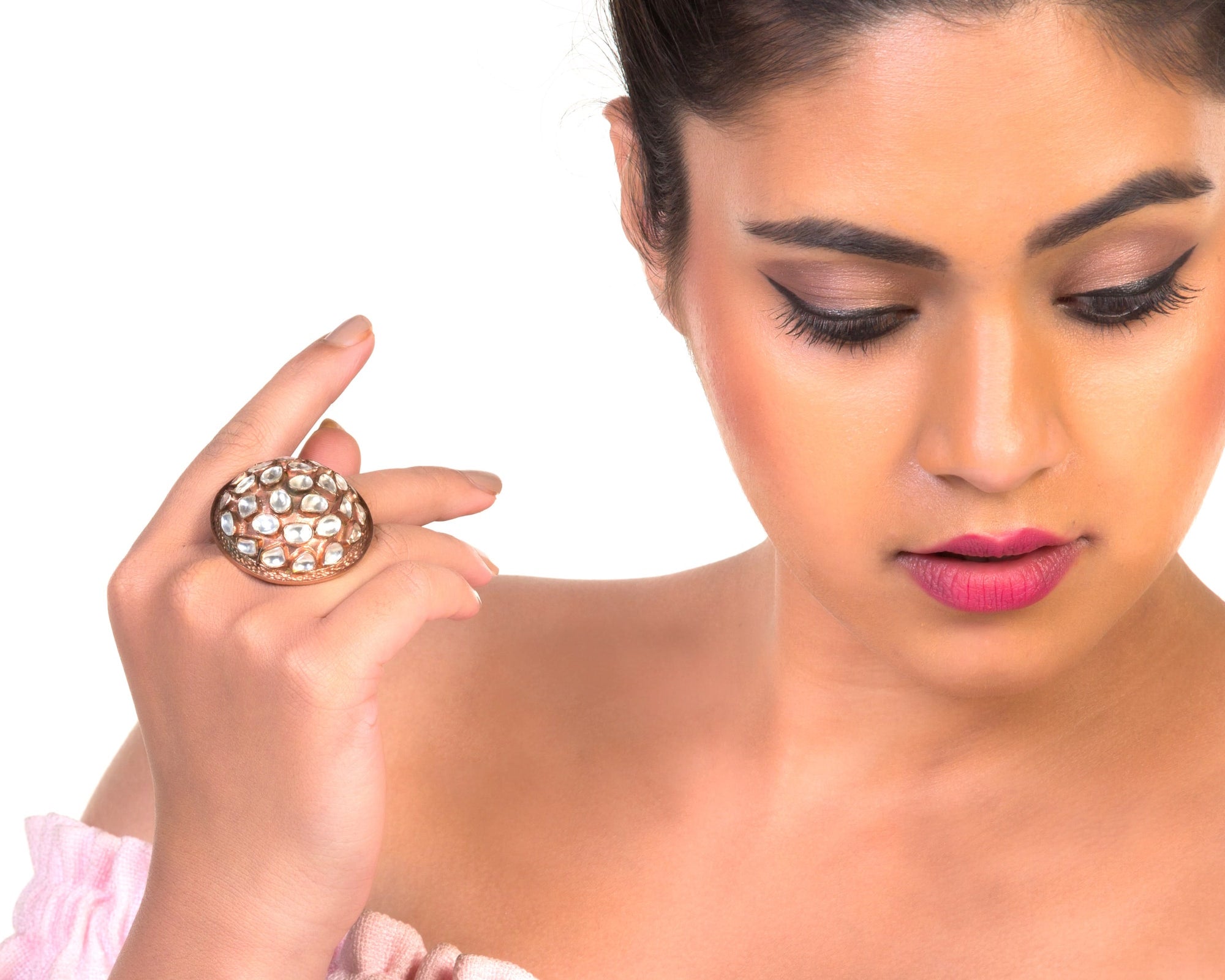 model with shiny dome finger ring