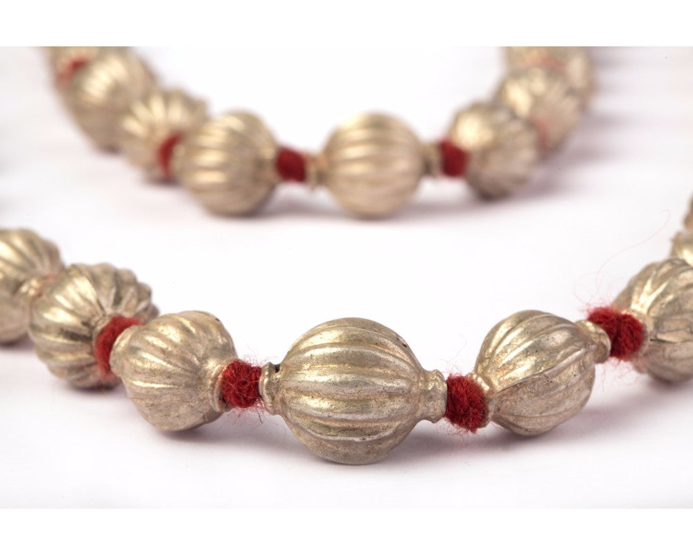 Antique silver beads in red thread necpiece